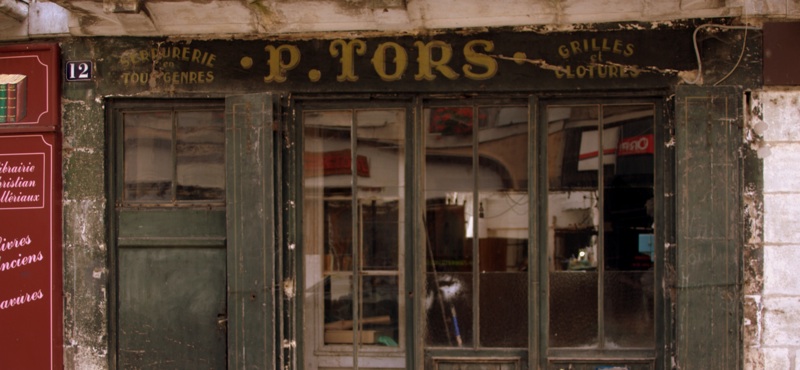 Shopfront in La Charite by A.M. Roos