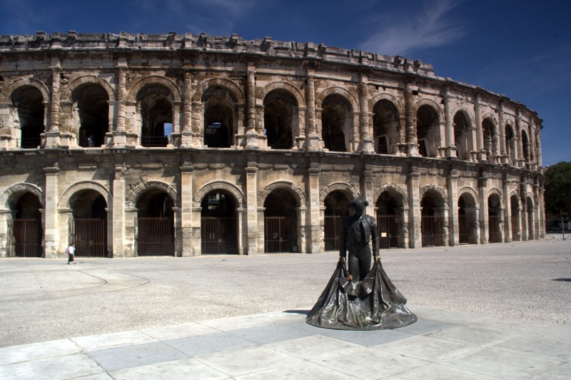 Roman Amphitheatre in Nimes by A.M. Roos